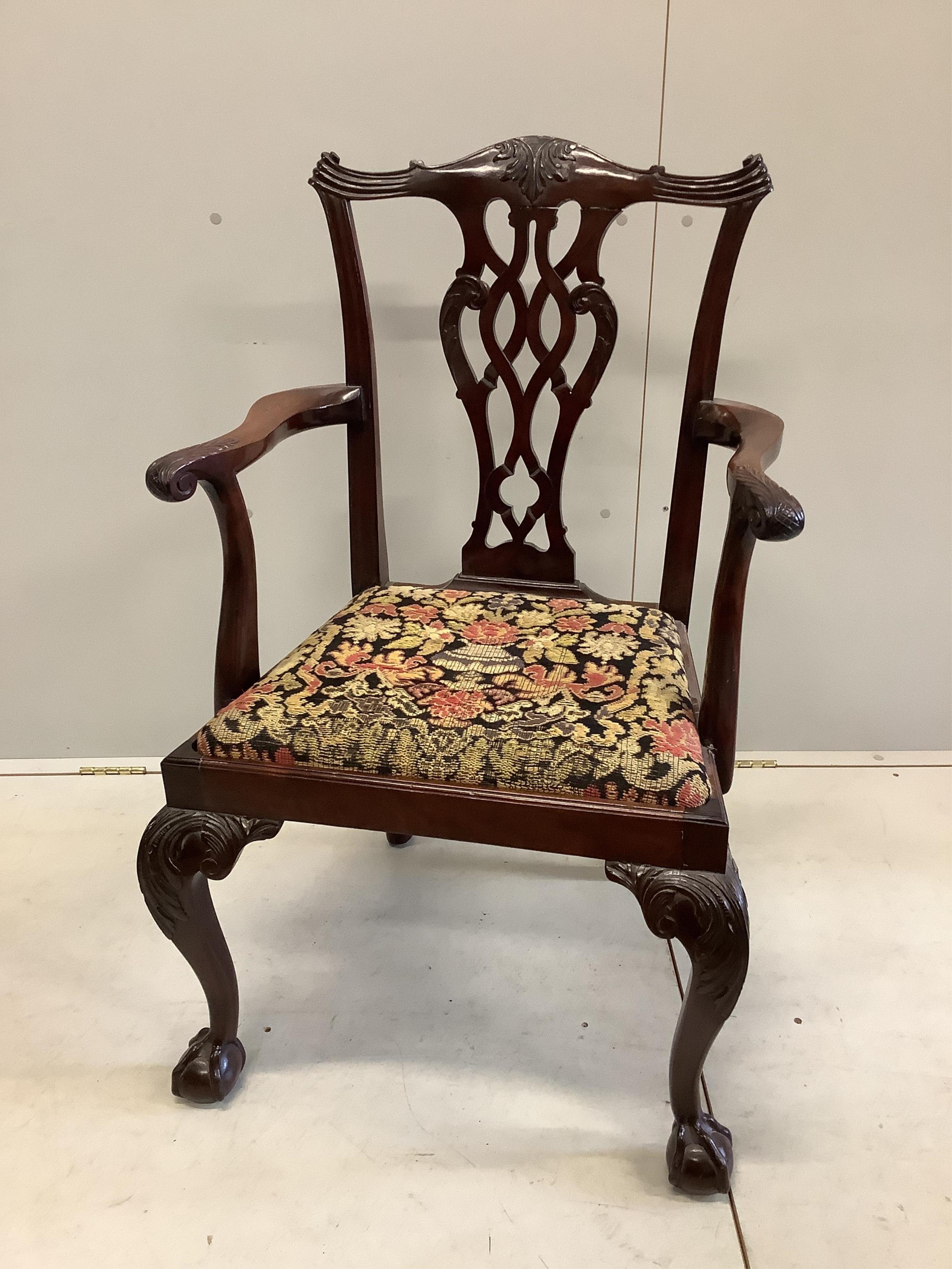 A pair of George III Sheraton style mahogany dining chairs and a pair of George III style mahogany elbow chairs. Condition - good